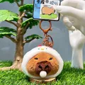 Cute Capybara plush keychain with white doll hat and brown metal clip on a bag - Chicken Headwear