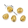Macro detail of 5mm x 6mm irregular golden stainless steel beads for DIY jewelry making - Style F / Gold
