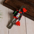 Macro detail of sequined Halloween slap bracelet with red plush character and festive decor - Glowing Red Monster Cat