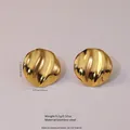 Golden round stainless steel stud earrings with modern irregular hammered texture design - Stainless Steel Hammered Round Studs