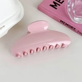 Detail of a large pink acrylic hair claw clip on an aesthetic white background - Light Pink