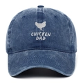 Close-up of embroidered white Chicken Dad text and rooster on washed blue denim cap - One Size / Navy Blue
