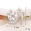 Detail of high heel brooch with white rhinestones and grey cat eye stone petals - Silver Cat Eye High Heel + Disc