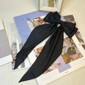Elegant black oversized satin bow hair clip with long ribbons and metal spring fastener - Black
