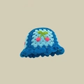 Detail of blue crochet baby hat featuring handmade pink cherry motifs and wavy brim - M (56-58cm) / Cherry Blue