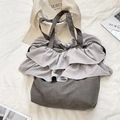 Detail view of the grey ruffled shoulder bag with multi-layer pleated fabric design - Dark Gray