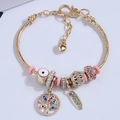 Gold snake chain bracelet with Tree of Life pendant, Evil Eye charm, and LOVE tag - Pink