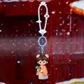 Traditional Chinese girl doll keychain in orange Hanfu with light blue silicone strap - Maiden with Ruyi Keychain