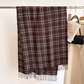 Detail of brown plaid scarf with classic tassels hanging in a lifestyle setting - Brown Plaid (WT152-6)