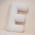 Plush letter E shaped pillow in soft white sherpa fabric for minimalist home decor - Letter E
