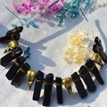 Detailed view of black quartz crystals and golden raven skulls on a gothic crown - Obsidian + Antique Bronze Crow + Antique Bronze Wire