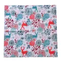 Close-up of square holiday napkins featuring festive reindeer and snowflake patterns - Reindeer and Floral Print Christmas Napkins