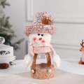 Christmas snowman candy jar with pink sequined hat and golden fabric base - Snowman