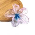Macro detail of glitter gradient plumeria hair claw clip on a wooden tray - Glitter Transparent Flower Claw [Blue]