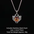 Collana con pendente occhio del diavolo gotico con occhio arancione e catena in acciaio inox - Malocchio Giallo
