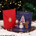3D Pop-up Christmas card with Santa and reindeer theme featuring a deep blue inner design - Christmas Cake (With Envelope) / 12x12cm