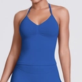 Detail of royal blue seamless sports bra featuring V-neckline and ribbed hem textures - Deep Sea Blue