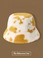 Winter plush bucket hat with yellow cow print, furry warm fisherman hat for cold weather - Cow Print Bucket Hat - Yellow