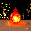 Red spherical Christmas lantern with Santa scene, warm light, 13.5x7x7cm dimensions - Round Wind Lamp - Red Santa