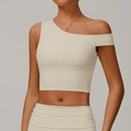 Brassière de yoga asymétrique beige en tissu recyclé avec coupe sport minimaliste - S / Hauts / Abricot Crème