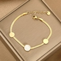 Gold snake chain bracelet featuring white mother-of-pearl charms on a satin box - Gold White Shell Disc (BR-40)