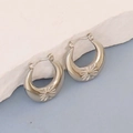 Silver irregular geometric crescent hoop earrings with engraved starburst pattern - Silver Style K7-26