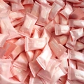 Bulk portable compressed face towels in pink individual packaging for travel and skincare - Pink Individual Packaging