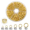 Golden open jump ring set for jewelry making with circular storage case and sizing tool - Gold Jump Rings In 6-Grid Box
