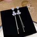 Elegant silver tassel earrings featuring heart and clover rhinestone studs in black box - Silver Heart Flower Tassel (E0177)
