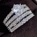 Elegante zilveren 3-delige verlovingsringenset met ronde zirkoon en holle dubbellaagse banden - US 6 / Witgoud