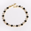 Detail of 18k gold plated spacer bead with square black and clear cubic zirconia - 4mm Black White Gold