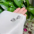 Zilveren sneeuwvlok oorclips met sprankelende AAA-zirkonia en zachte siliconen pads - Clip-on Stijl / Witte Zirkonia Oorklem