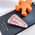 Triangle tweed hair clip with pink Cute letter charm on a black notebook prop - Triangle-Plaid Pink