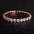 Detail of rose gold tennis bracelet featuring sparkling zircon stones on a black background - 5mm Rose Gold 17cm