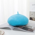 Sky blue wool beret hat with a felt texture and top tail design for women - One Size / Blue
