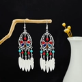 Bohemian silver earrings with colorful beads and dangling metal feather tassels - Colorful