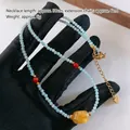 Tiger eye beaded necklace with light blue faceted stones and yellow irregular accent bead - Yellow Chalcedony Necklace XL0706