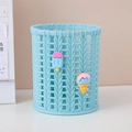 Light blue pencil holder with woven texture and cute ice cream charms on a desk - Ice Cream Cone