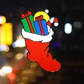 Christmas stocking window sticker with vibrant gift box details in a festive night scene - Christmas Sock