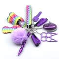 Macro detail of purple self-defense keychain set with alarm and wristlet strap - Rainbow Wave
