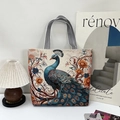 Ethnic embroidered canvas tote bag with peacock patterns and striped handles - Peacock