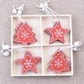 Set of 4 red wooden Christmas tree and star ornaments with white snowflake patterns in a box - Style G Tree/Pentagram