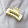 Matte pale yellow square hollow hair claw clip in a minimalist Korean style - Off White