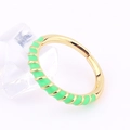 Macro view of adjustable gold-plated ring with vibrant neon green enamel spiral texture - Adjustable Open / Green