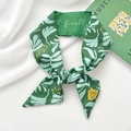 Green silk hair scarf with white ginkgo leaves and delicate floral print patterns - Clary Sage