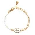 Detail of gold chain and white beads bracelet with oval cross charm and lobster clasp - White