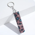 Detailed view of leopard print rhinestone refillable perfume bottle keychain - C12-Pink & Blue Camo