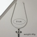 Detail view of a 51cm silver cross necklace weighing 40g with black gemstones - X302-Cross