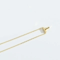Minimalist golden necklace featuring a T-shaped pendant on a delicate chain - Letter T