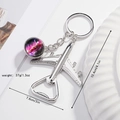 Detailed view of silver airplane bottle opener keychain with size and weight dimensions - Neon Star Galaxy